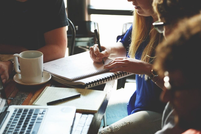 People organizing at a coffee shop